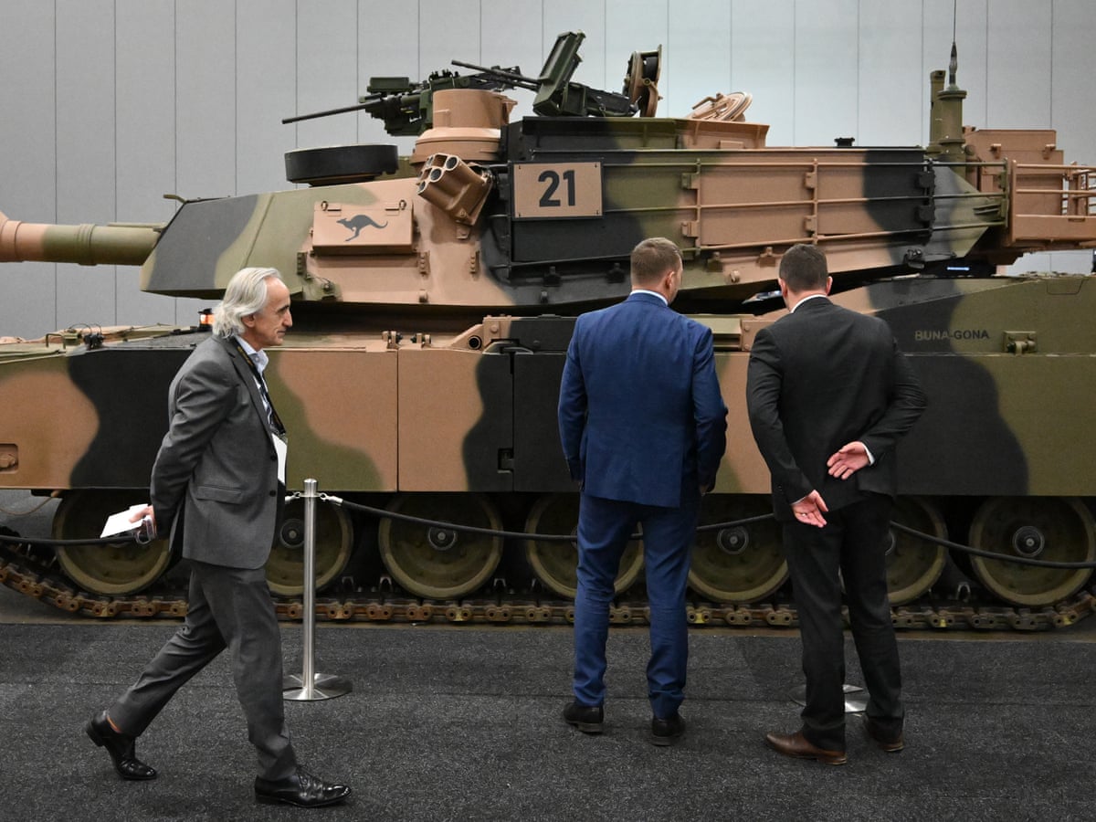 At Melbourne's weapons expo, arms dealers snack on popcorn a grenade's throw from tanks and autonomous robots | Melbourne | The Guardian