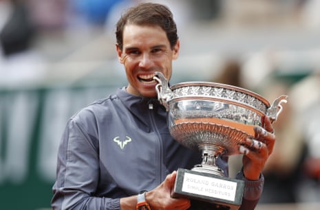 Rafael Nadal poses with the trophy after beating Dominic Thiem in the 2019 final to secure a record-extending 12th French Open title