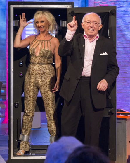 Debbie McGee performing magic with Daniels in 2013.