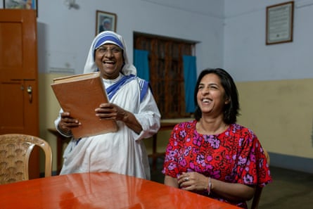 Jane rejoices after finding her name in the register book at the Mother Teresa Orphanage in Old Dhaka, Bangladesh.