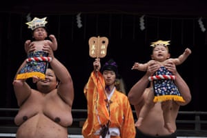 Babies are carried by sumo wrestlers on a ring during the Nakizumo event at Sanctuary Yukigaya Hachiman grounds. Nakizumo (crying sumo) is a 400-year-old traditional Japanese event to pray for the health and growth of babies, originating from the legend that a baby’s cry wards off evil