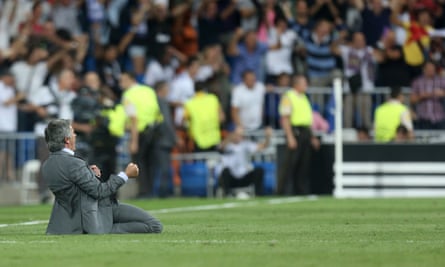 José Mourinho marks Cristiano Ronaldo’s winning goal for Real Madrid against Manchester City at the Bernabéu in 2012 with a knee slide.
