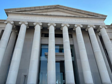 Alabama supreme court building against blue background