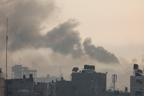 Smoke rises in the aftermath of Israeli strikes on houses in Khan Younis