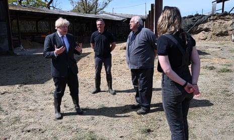 Boris Johnson visits Moreton farm near Wrexham, north Wales, in April.