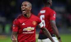 Ashley Young celebrates Manchester United’s win at Chelsea. He said the team had hoped to draw Manchester City in the next round.