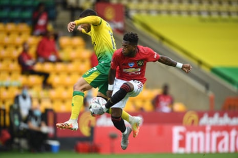 Norwich City’s Emiliano Buendia battles for possession with Fred.