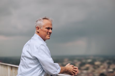 a man looking over a railing