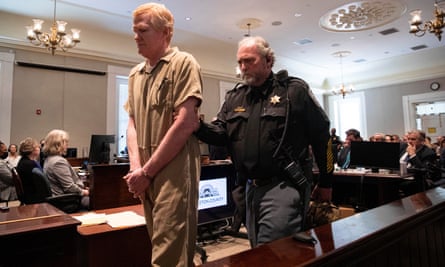 officer ushers Murdaugh through courtroom