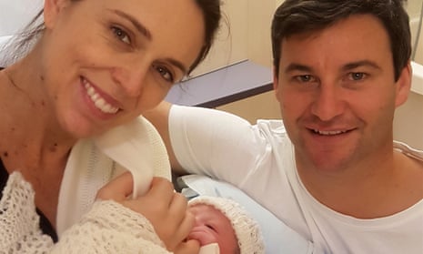 New Zealand prime minister Jacinda Ardern poses with her partner Clarke Gayford and their baby.