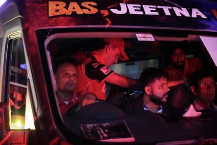 Punjab Kings team members evacuate the stadium during the IPL match on Thursday