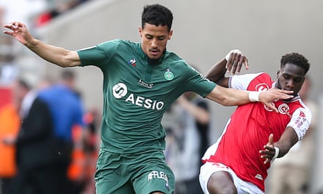 William Saliba (left) tussles with Reims’ Boulaye Dia during the Ligue 1 game in April.