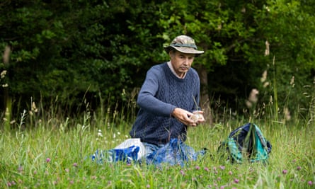 Martin White releasing mazarine blues he bred himself into the wild.