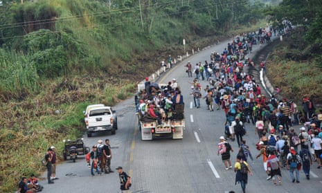 MEXICO-HONDURAS-US-MIGRATIONHonduran migrants taking part in a caravan heading to the US, walk alongside the road in Huixtla, Chiapas state, Mexico, on October 24, 2018. - Thousands of mainly Honduran migrants heading to the United States, a caravan President Donald Trump has called an “assault on our country”, continued their march to the US after one-day rest in Huixtla, Chiapas state in Mexico. (Photo by Johan ORDONEZ / AFP)JOHAN ORDONEZ/AFP/Getty Images