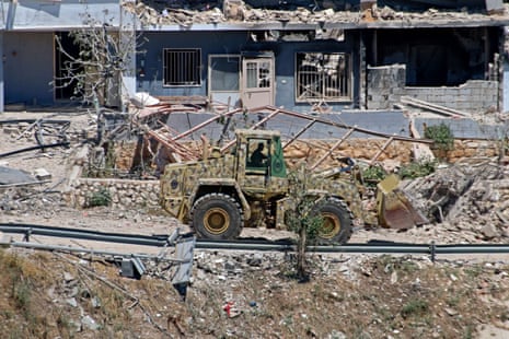 A Lebanese army bulldozer advances along the main road in the southern border village of Debbine on June 4, 2026, as the Israeli military reportedly begins a gradual withdrawal from the village.