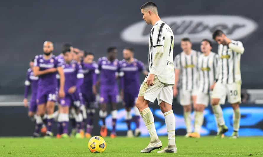 Cristiano Ronaldo looks down after Alex Sandro’s own goal left 10-man Juventus facing an uphill struggle against Fiorentina.