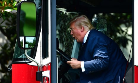 Donald Trump sits in the seat of a fire truck made in Wisconsin during a Made in America product showcase.