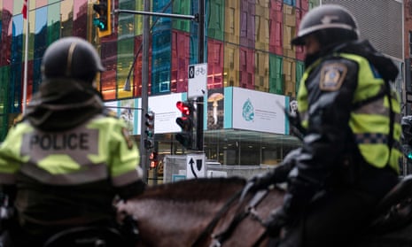 Members of the Montreal Police patrol outside the United Nations Biodiversity Conference (COP15) in Montreal as Canada vows to review a police radio deal with ties to China.