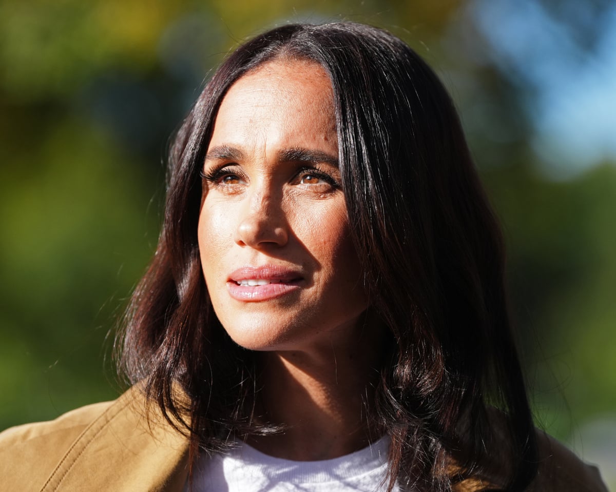 Meghan has been cast as the inverse to Diana, a photonegative of adoration. Why do we need scapegoats? | Brigid Delaney | The Guardian