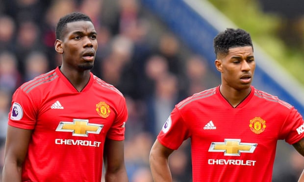 Paul Pogba and Marcus Rashford playing together for Manchester United in 2019.