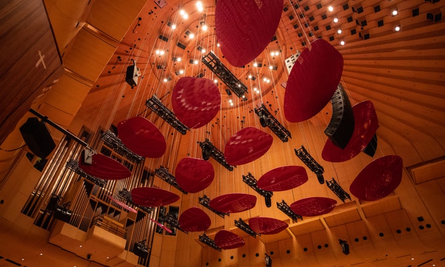 Fibreglass sound reflectors above the stage.