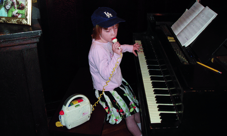 Billie Eilish, performing at home as a child.