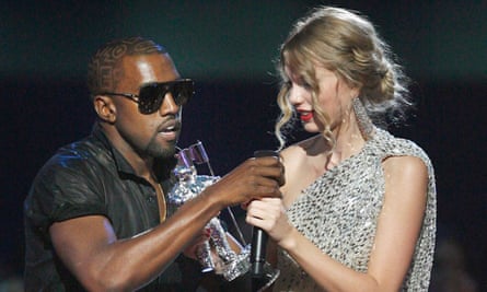 Kanye West takes the microphone from Taylor Swift during the MTV Video Music awards, 13 September 2009.