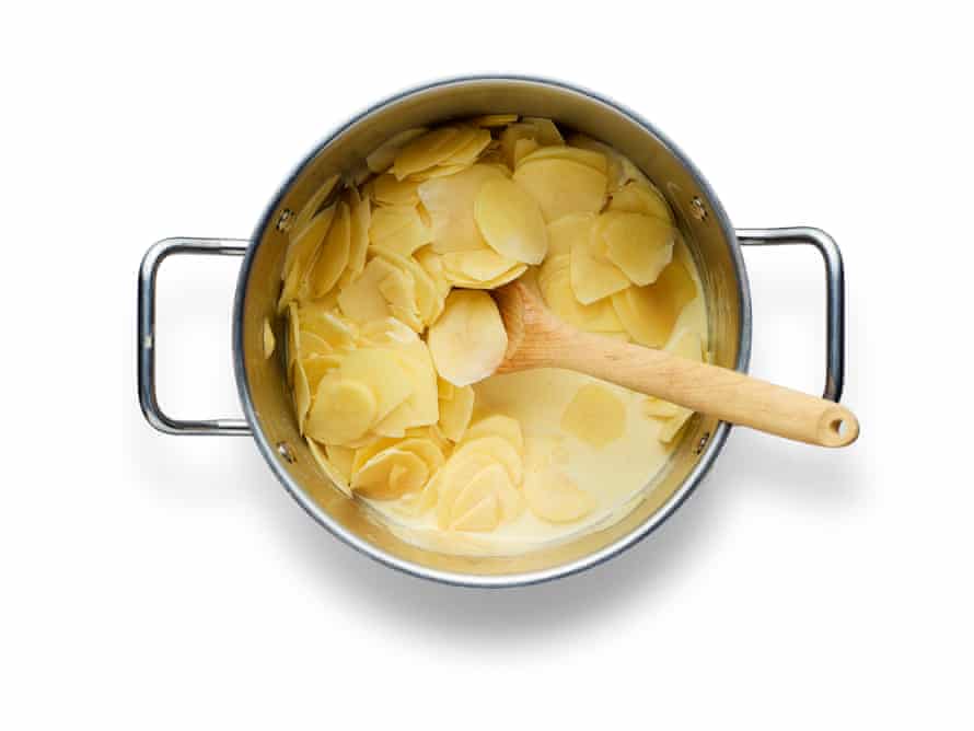 How to make gratin dauphinois – recipe | Food 6 Felicity Cloake’s masterclass – dauphinois potatoes_05. Add spuds to milky cream.