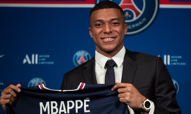 Kylian Mbappé poses after his world record contract renewal