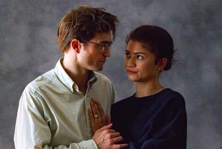 Studio shot of the actors looking at each other soulfully