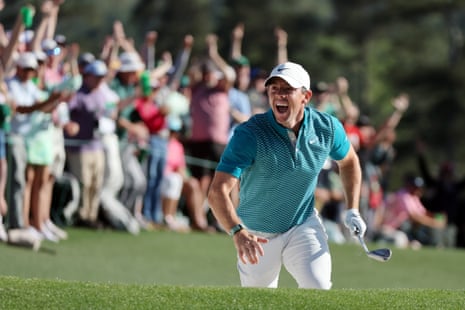 Rory McIlroy reacts after holing out from the bunker.