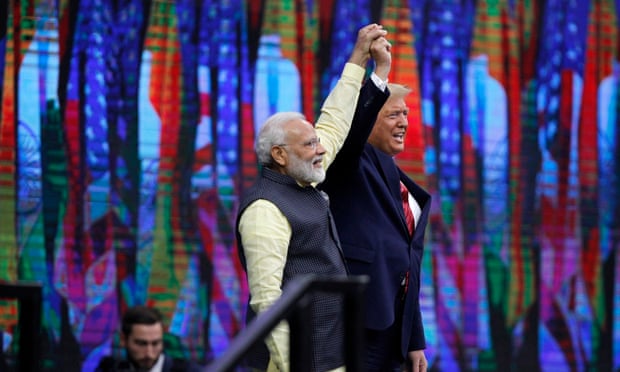 Howdy Modi Community Summit with Indian Prime Minister Narendra Modi and United States President Donald Trump speaking.<br>epa07862247 Indian Prime Minister Narendra Modi (C-L) and US President Donald J. Trump (C-R) speak to a crowd of over fifty thousand at the ‘Howdy Modi’ community summit at NRG Stadium in Houston, Texas, USA, 22 September 2019. The event was hosted by the Texas India Forum. EPA/PATRIC SCHNEIDER
