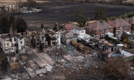 Aftermath of a wildfire in Wennington, Greater London, on the day the UK recorded its hottest ever temperatures last year
