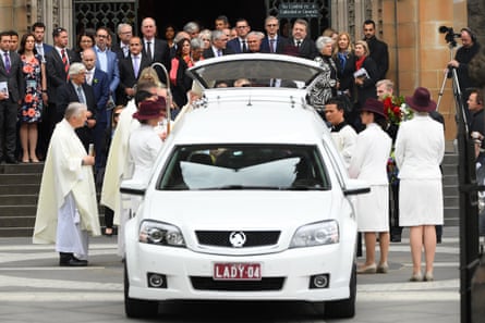 The casket is carried out of St Patrick’s Cathedral in Melbourne on Tuesday.
