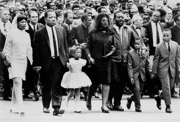 The family of Dr. Martin Luther King, Jr. walk in the funeral procession of the slain civil rights leader, in Atlanta.