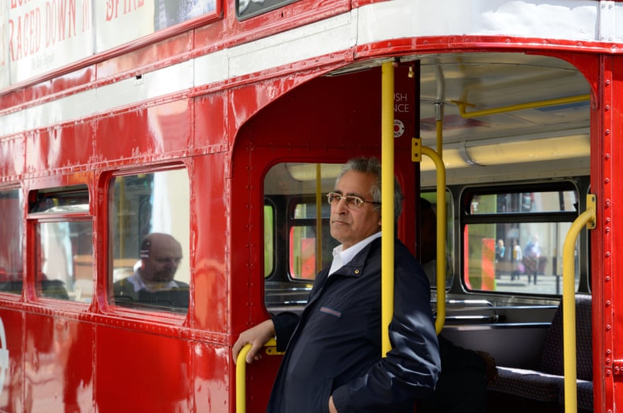 A conductor hangs on to the pole at the back of an old Routemaster. TfL could not afford conductors on each bus, and the ‘hop on, hop off’ element of the new routemasters was designed out.