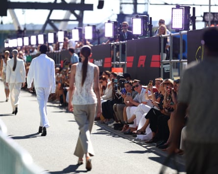 Models walk for an M&S campaign at Silverstone.