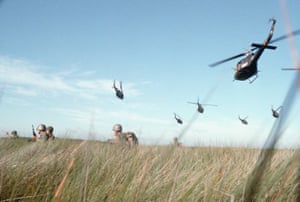 ARVN (South Vietnamese army) rangers, supported by helicopters, make their way through long grass during an assault into Plains des Joncs, Vietnam, 1965