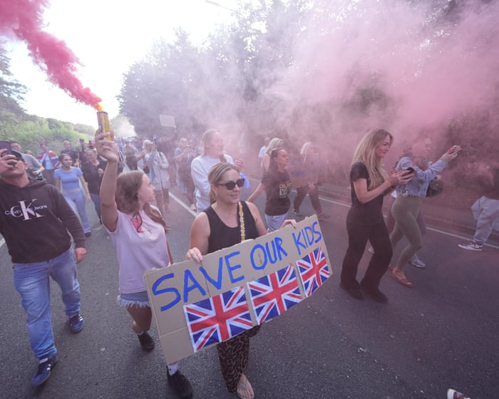 Five arrested as more than 1,000 protesters gather outside Essex asylum hotel