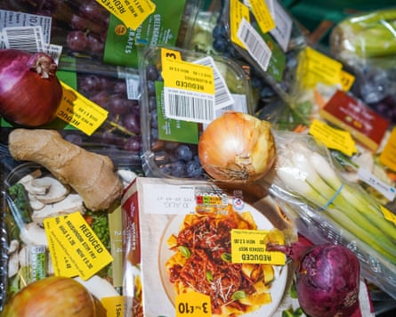 A collection of food items with yellow stickers indicating reduced prices