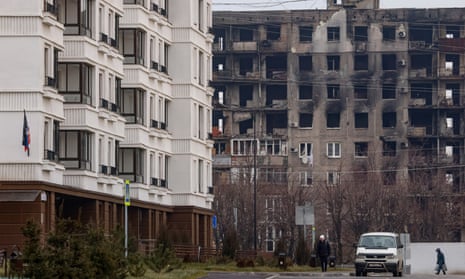 New apartments sit beside destroyed housing in Mariupol. During the hostilities, about 5,000 civilians were killed due to fighting and shelling and up to 70 per cent of the housing stock of Mariupol was destroyed, Konstantin Ivashchenko, the new mayor of the city said.