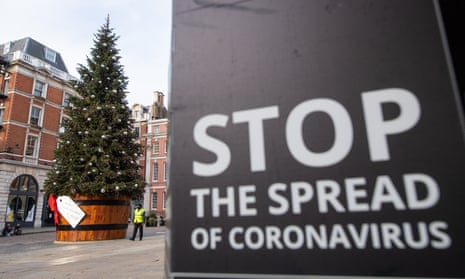Christmas tree in Covent Garden, London. Being outdoors and socially distanced helps lessen the risk of virus transmission.