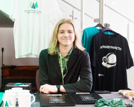 Rhun sitting near Plaid merchandise