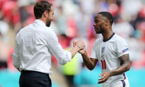 Raheem Sterling of England is congratulated by Gareth Southgate after a fine afternoon's work at Wembley.