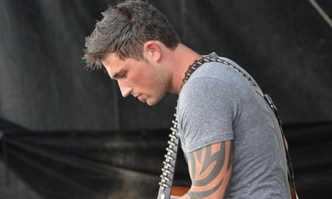 Michael Ray: he loves both Jesus and tattoos.