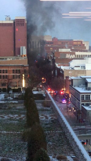 Smoke billows from explosion site.