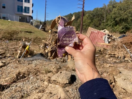 someone holding a destroyed bag of tea