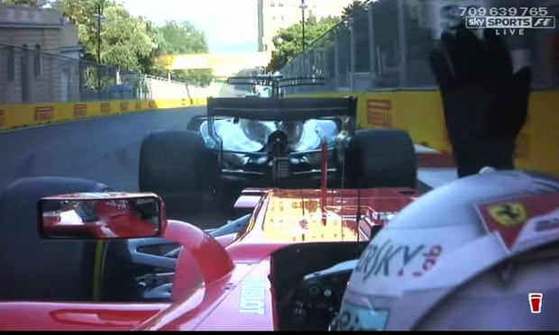 Sebastian Vettel, behind, remonstrates after running into the back of Lewis Hamilton’s Mercedes at the Azerbaijan Grand Prix.