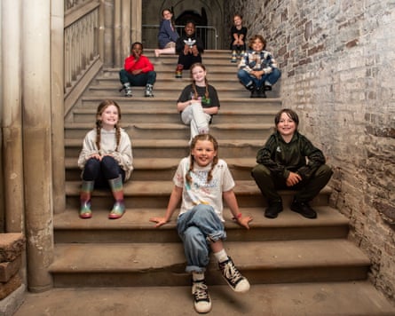 Children sitting on some steps