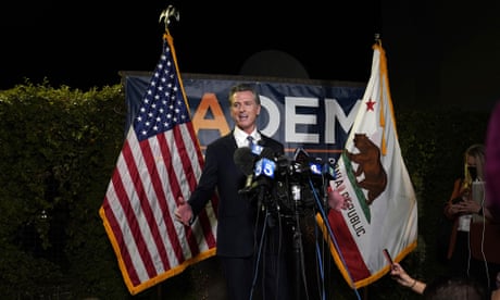 Gavin Newsom addresses reporters in Sacramento, California, on 14 September.